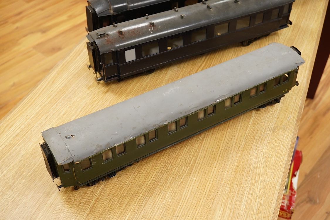 Four Gauge One Continental bogie coaches; two in very dark Green livery, and two ‘Trains Rapides Nord’ in dark green, including some scratch building and possible adaptation from kits